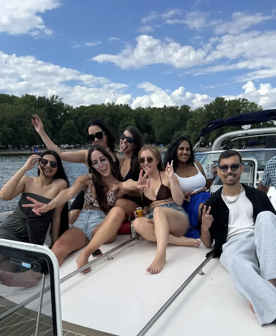 a man sitting at a desk looking at a computer screen