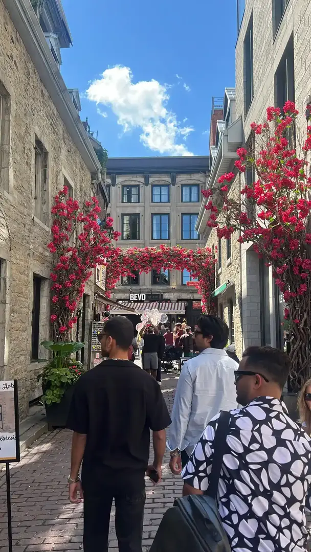 a man sitting in a chair looking at a computer screen